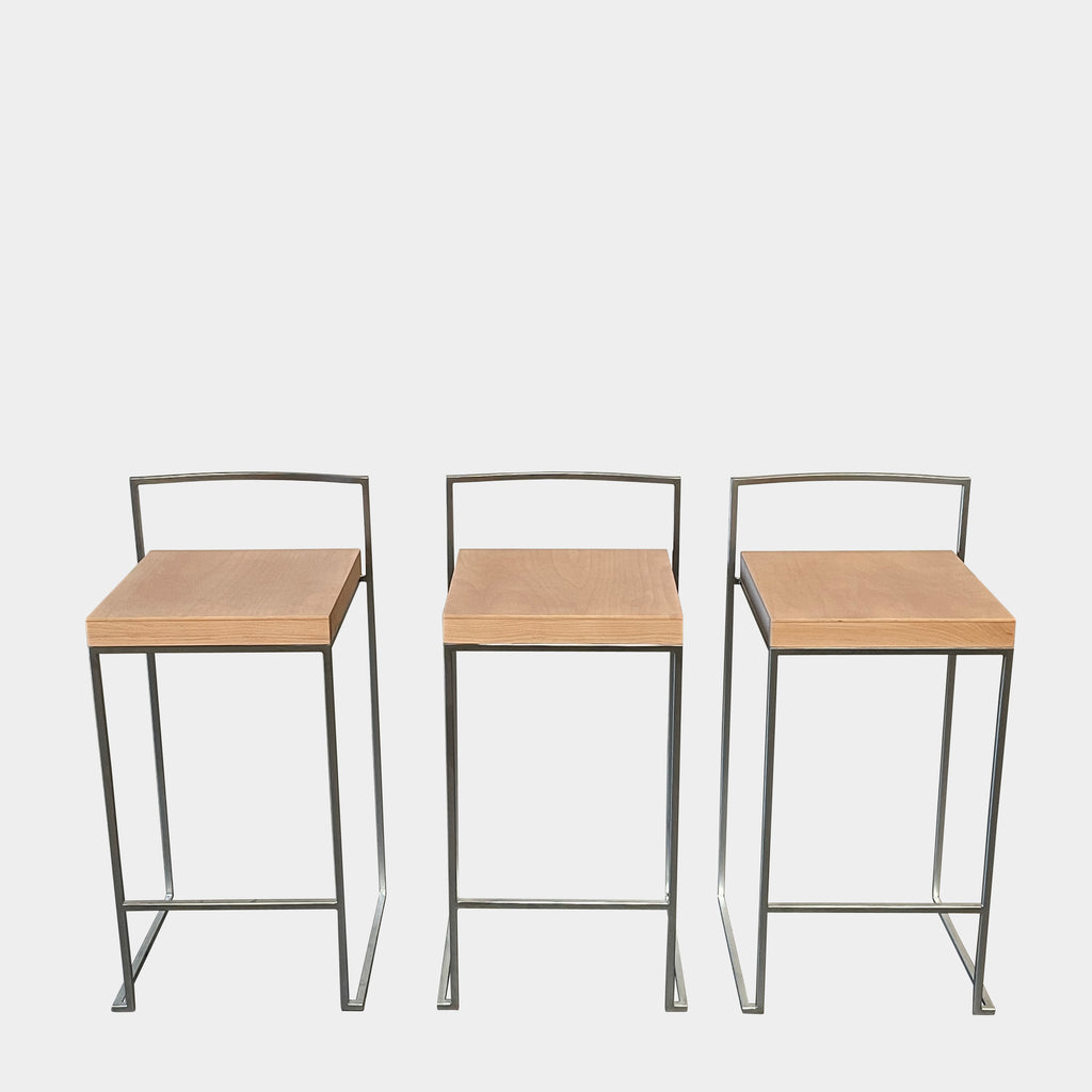 Three Lapalma Cubo Counter Height Stools with metal legs and wood seats.