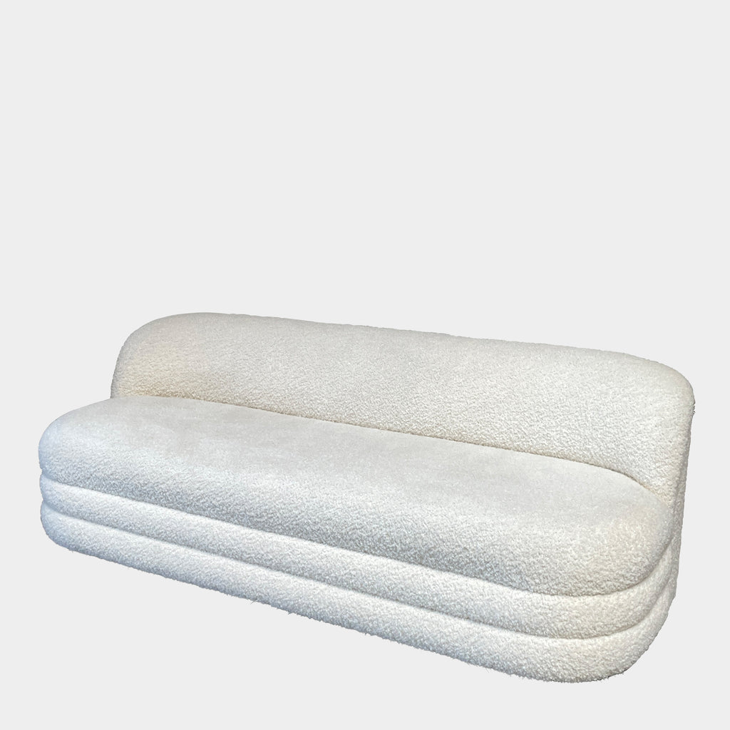 A Directional Crescent Sofa on a white background.