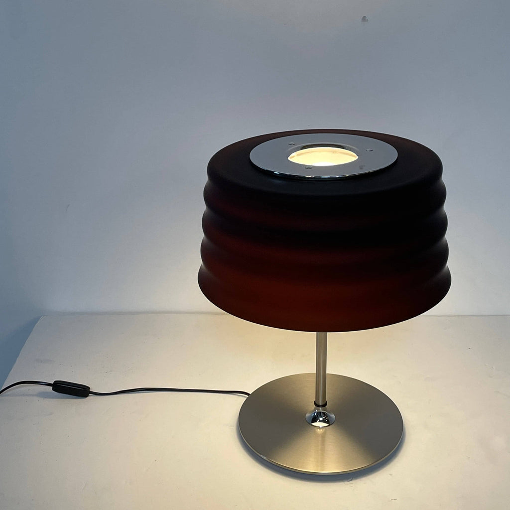 Penta C'Hi Table Light, Large with a black blown glass shade on a silver base against a white background.