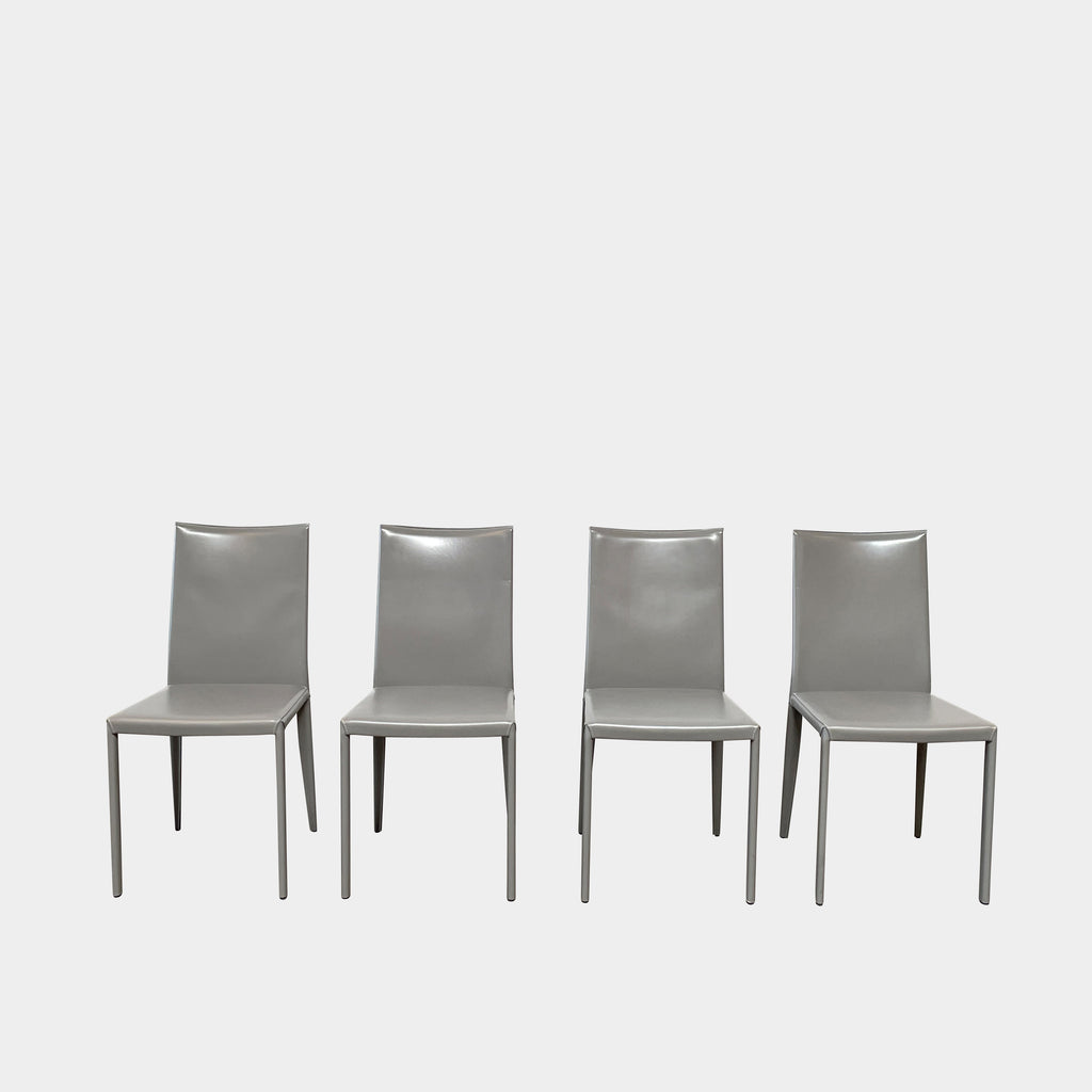 Four identical Frag Dining Bella Chairs Set in Light Grey Leather aligned in a row on a plain white background.