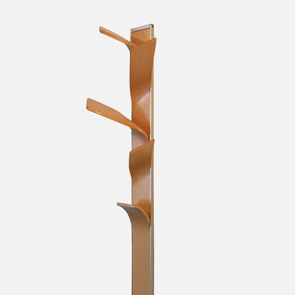 An elegant Punt Mobles ELX Coat Rack mounted on a white background.