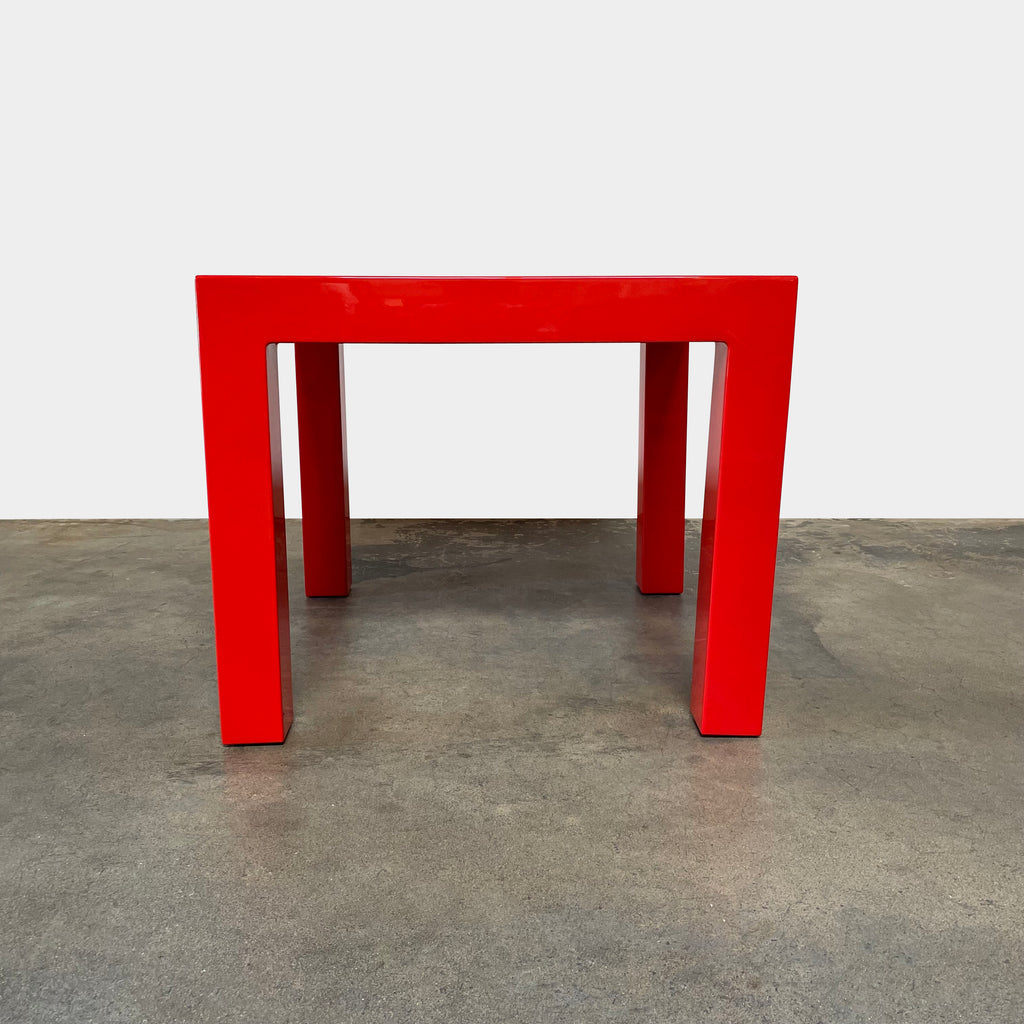 A Vondom weather-resistant red side table on a white background.