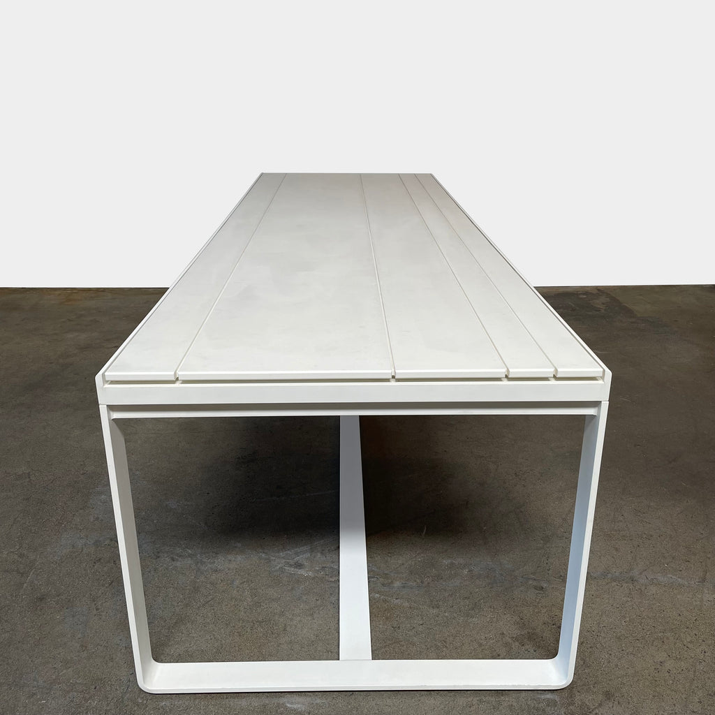 A white eco-friendly Gandia Blasco Flat Dining table 210 with a metal frame designed by Gandia Blasco.