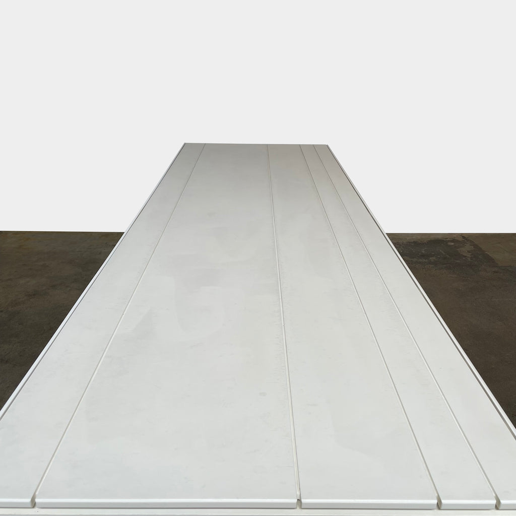 A white eco-friendly Gandia Blasco Flat Dining table 210 with a metal frame designed by Gandia Blasco.