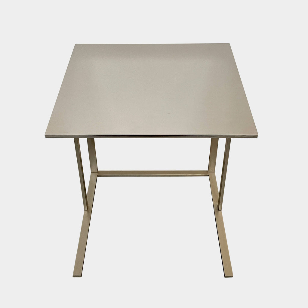 A small B&B Italia Elios Side Table with a metal frame.