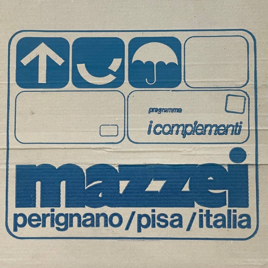 The Mazzei Multi-Panel Table by Mazzei is a contemporary design featuring a bench with a vibrant yellow, green, and blue top that adds functionality to any space.