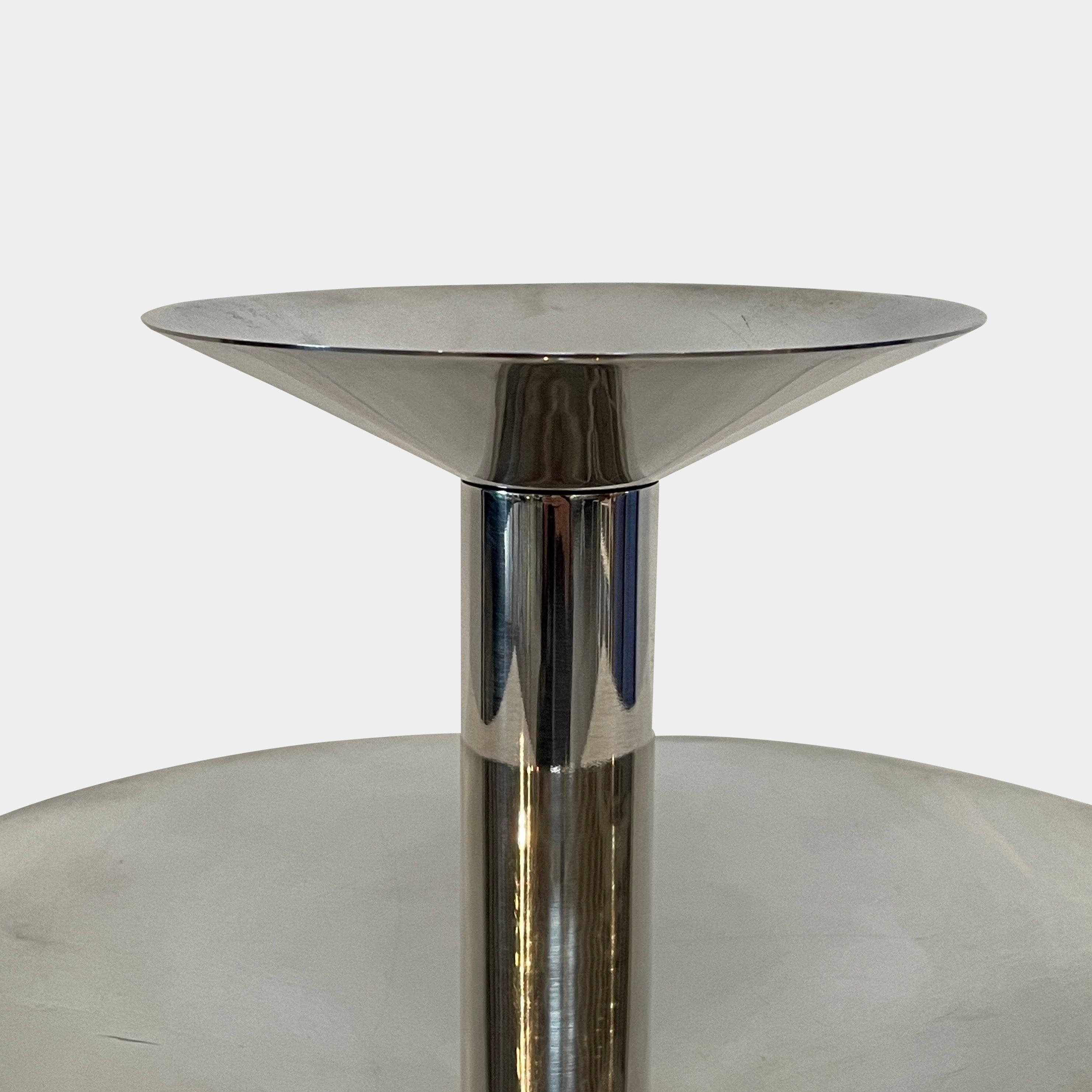 An Enzo Mari-inspired, tiered metal Driade Silver Fruit Stand Centerpiece with a reflective silver finish, isolated on a white background.