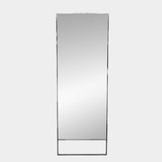 The Maxalto Psiche Mirror SMS1 Chrome, featuring a slim metallic frame, stands upright against a plain light gray background, reflecting the signature elegance of the Maxalto brand.