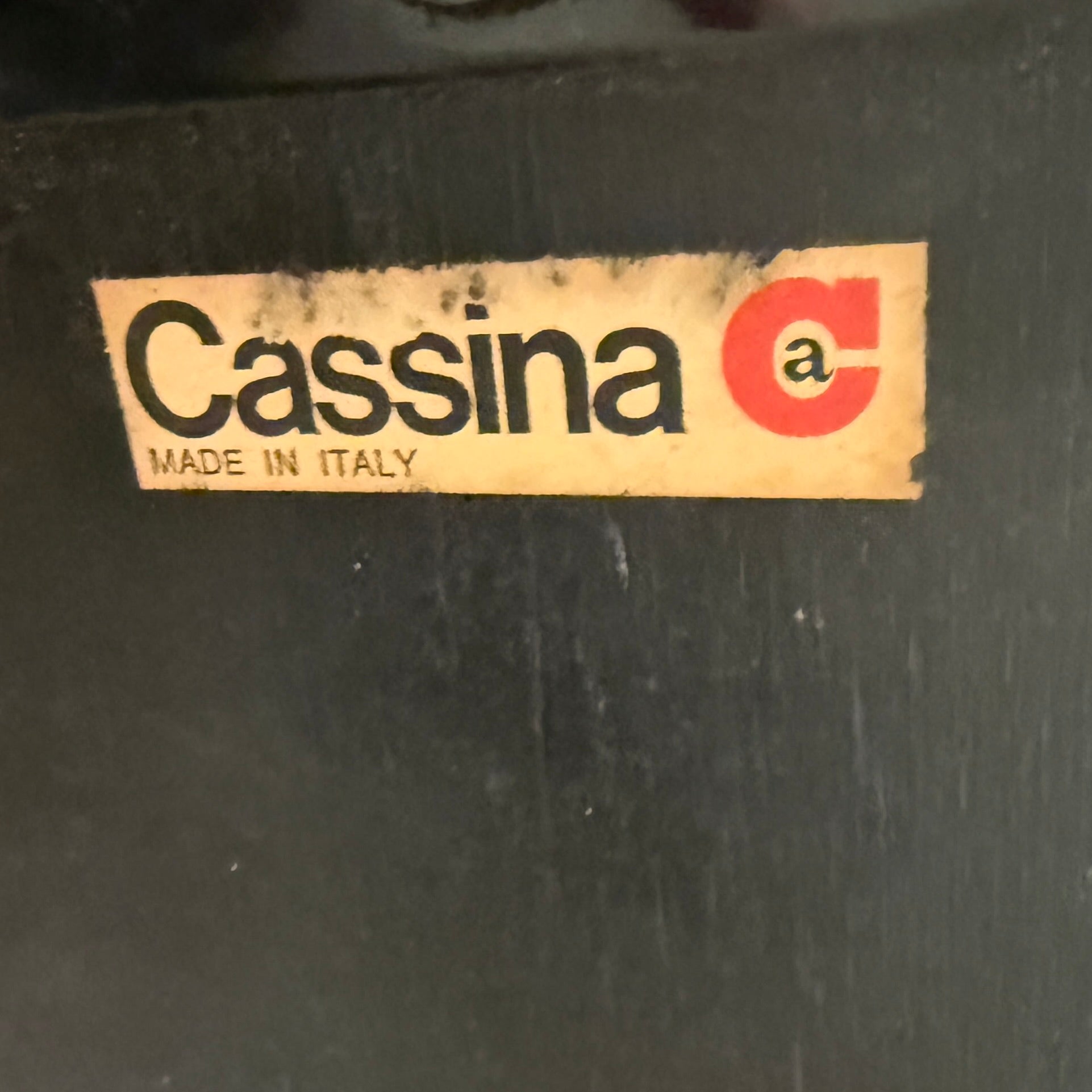 A set of two tan leather lounge chairs, echoing the vintage 1970s Cassina Soriana designs by Afra & Tobia Scarpa, showcases tufted backrests and tubular metal frames on a plain white background.