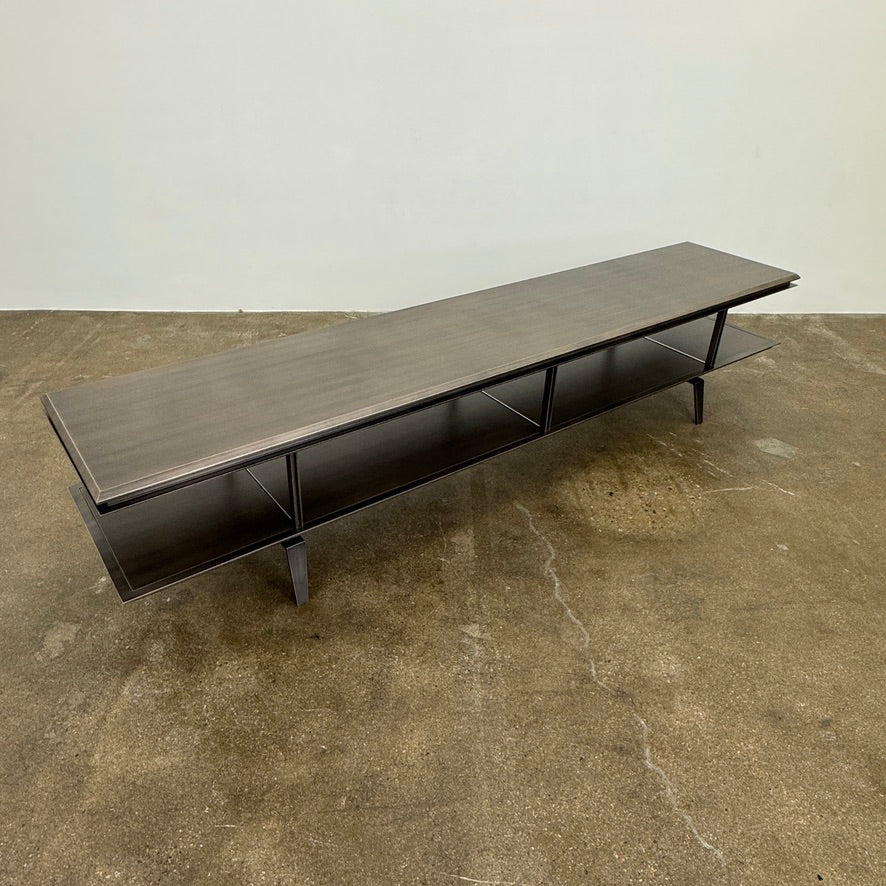 The Gallotti & Radice Pandora Console is a modern black TV stand featuring two open shelves and slim legs, shown on a plain white background. Check dimensions to ensure it fits your space perfectly.