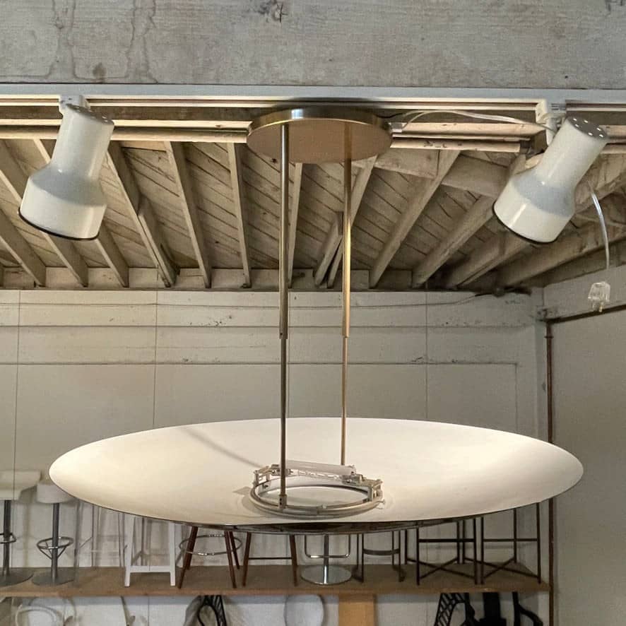 A Florian Schulz Sola 80 Ceiling Light with a white shade.