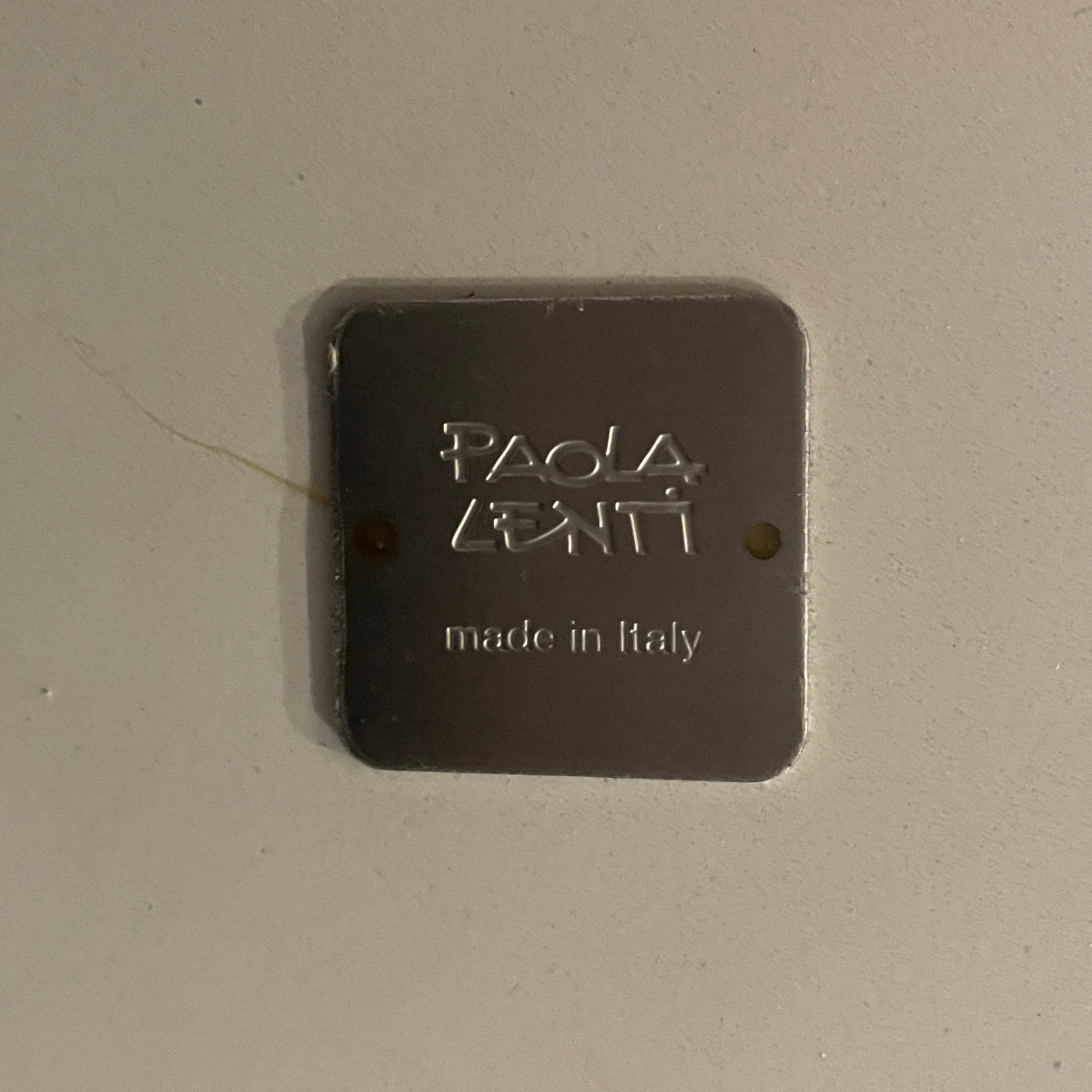 An adjustable-height Paola Lenti Giro Outdoor Side Table for outdoor living, displayed on a white background.