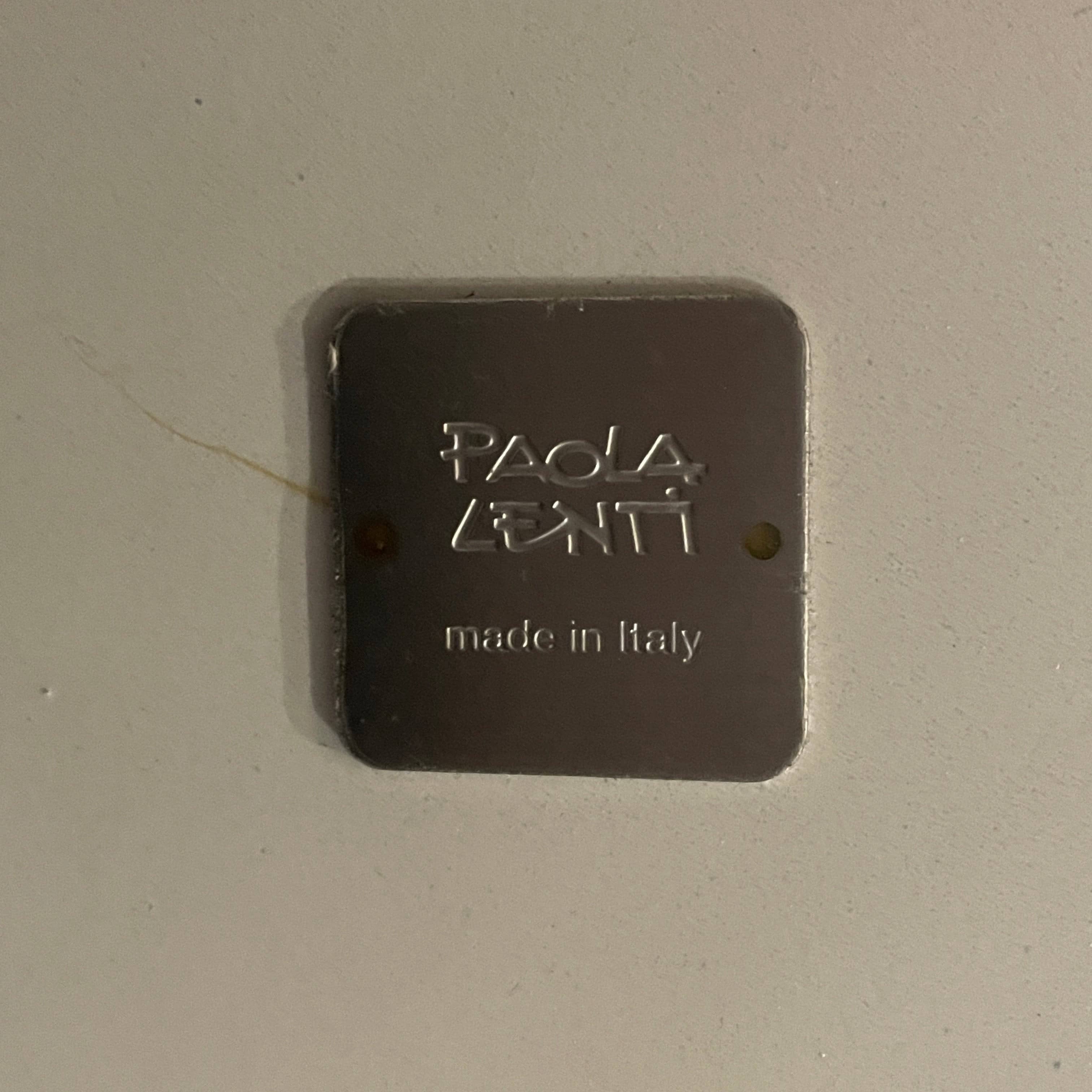 An adjustable-height Paola Lenti Giro Outdoor Side Table for outdoor living, displayed on a white background.