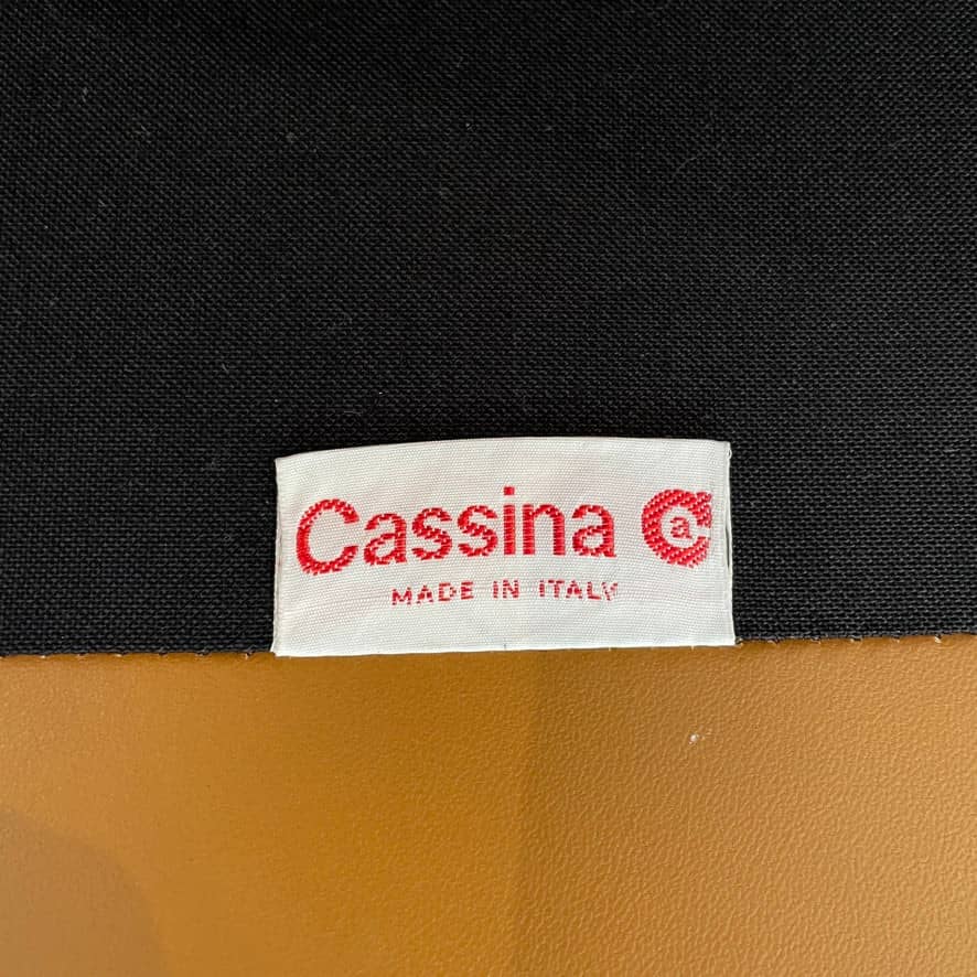 A Cassina Maralunga Two Seater sofa on a white background.