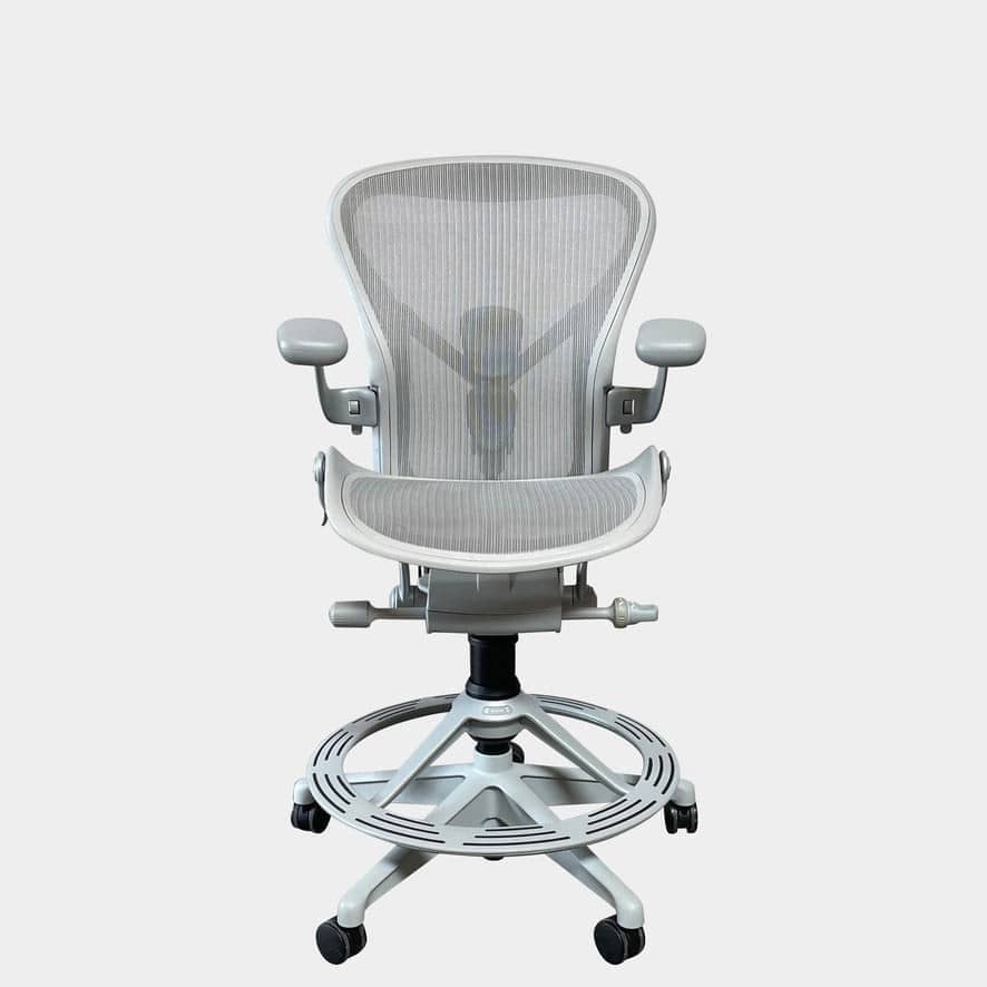 An Herman Miller Aeron Office Counter Stool, manufactured by Herman Miller, with a mesh seat.