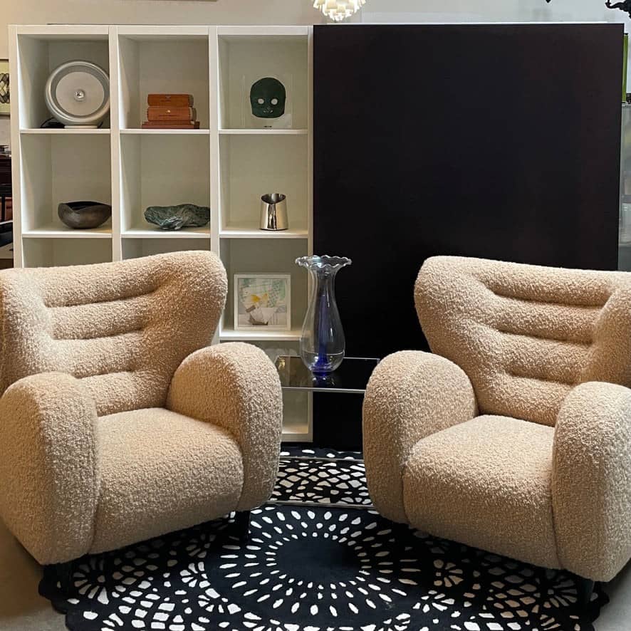 A pair of Pierre Augustin Rose Le Minotaure Armchairs on a white background by Pierre Augustin Rose.
