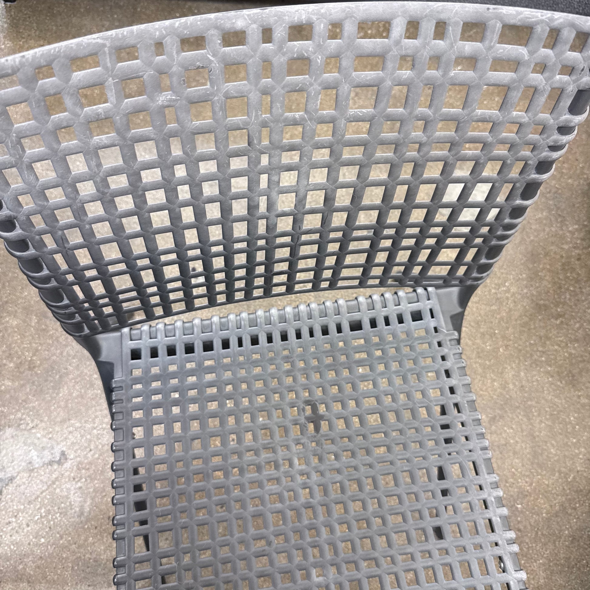 The Tribu Illum Outdoor Dining Table with 8 Chairs by Modern Resale features a sleek black finish and matching seating, set against a plain white background—an elegant choice for any modern outdoor space.