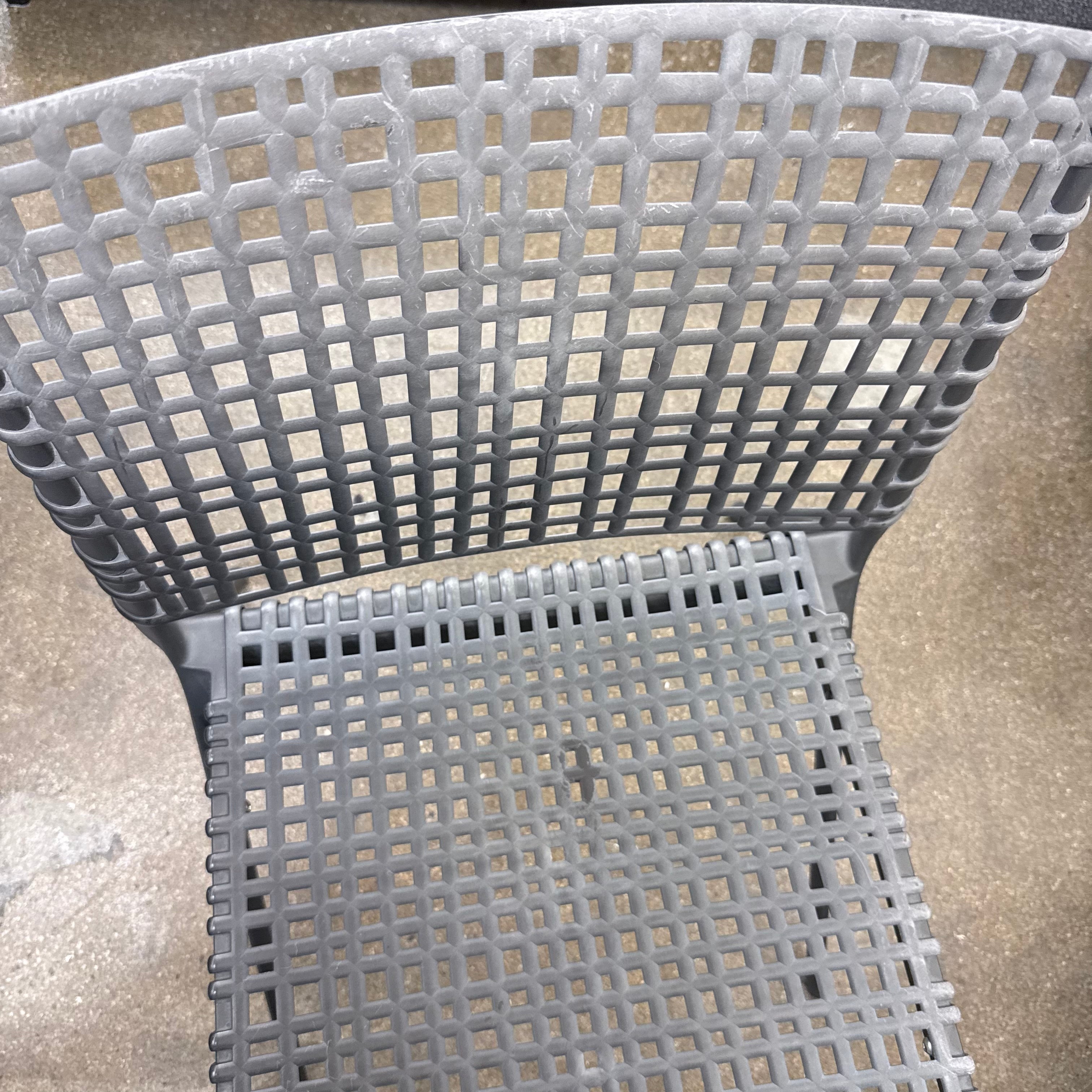 The Tribu Illum Outdoor Dining Table with 8 Chairs by Modern Resale features a sleek black finish and matching seating, set against a plain white background—an elegant choice for any modern outdoor space.