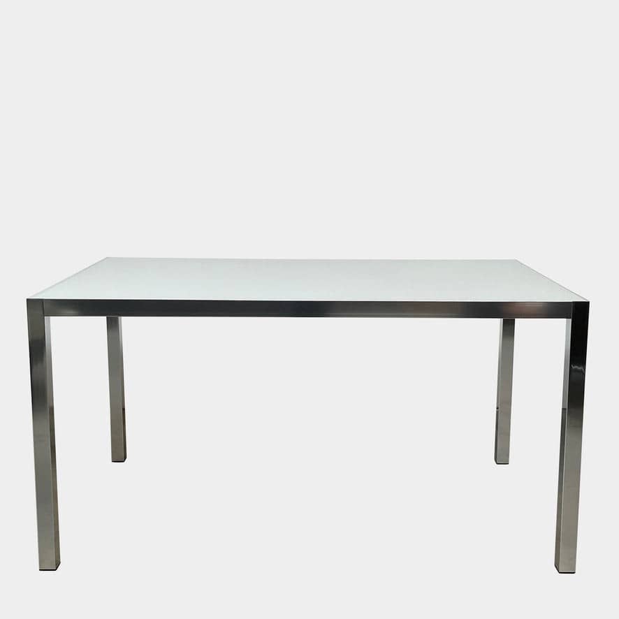 An MDF Italia LIM 04 Rectangle Dining Table with a stainless steel base and a white glass top.
