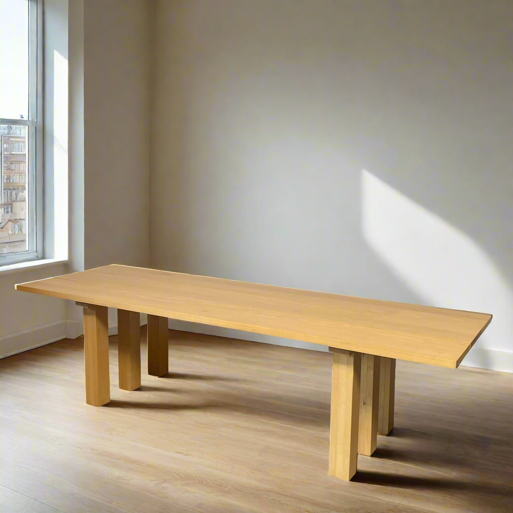 A Vintage Cassina La Basilica Dining Table by Mario Bellini, featuring a wooden rectangular design with a simple aesthetic and four legs, evocative of the iconic architectural style.