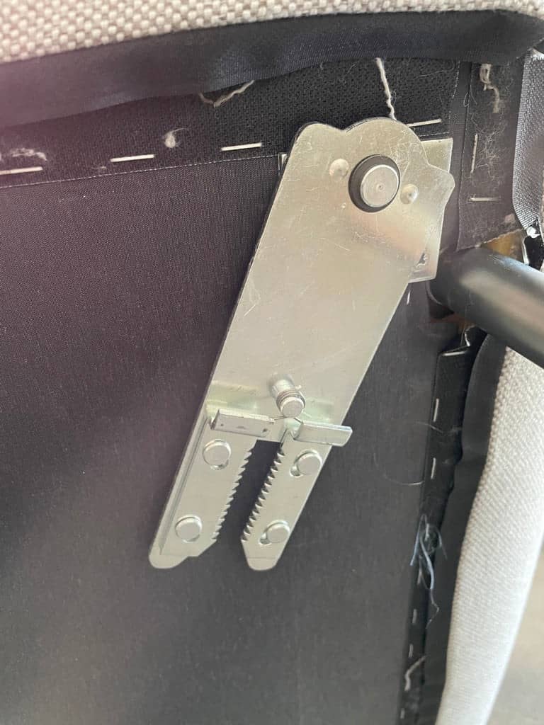 Modern curved Ligne Roset Yang Sectional sofa in durable wool fabric, isolated on a white background.