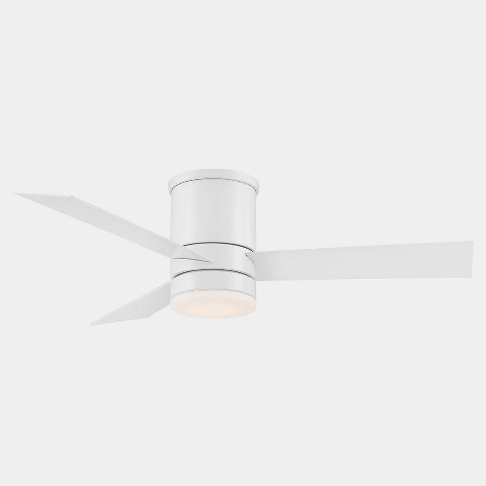 The Modern Forms Axis LED Flushmount Smart Fan in white features three blades and an integrated light, mounted on a plain white ceiling.