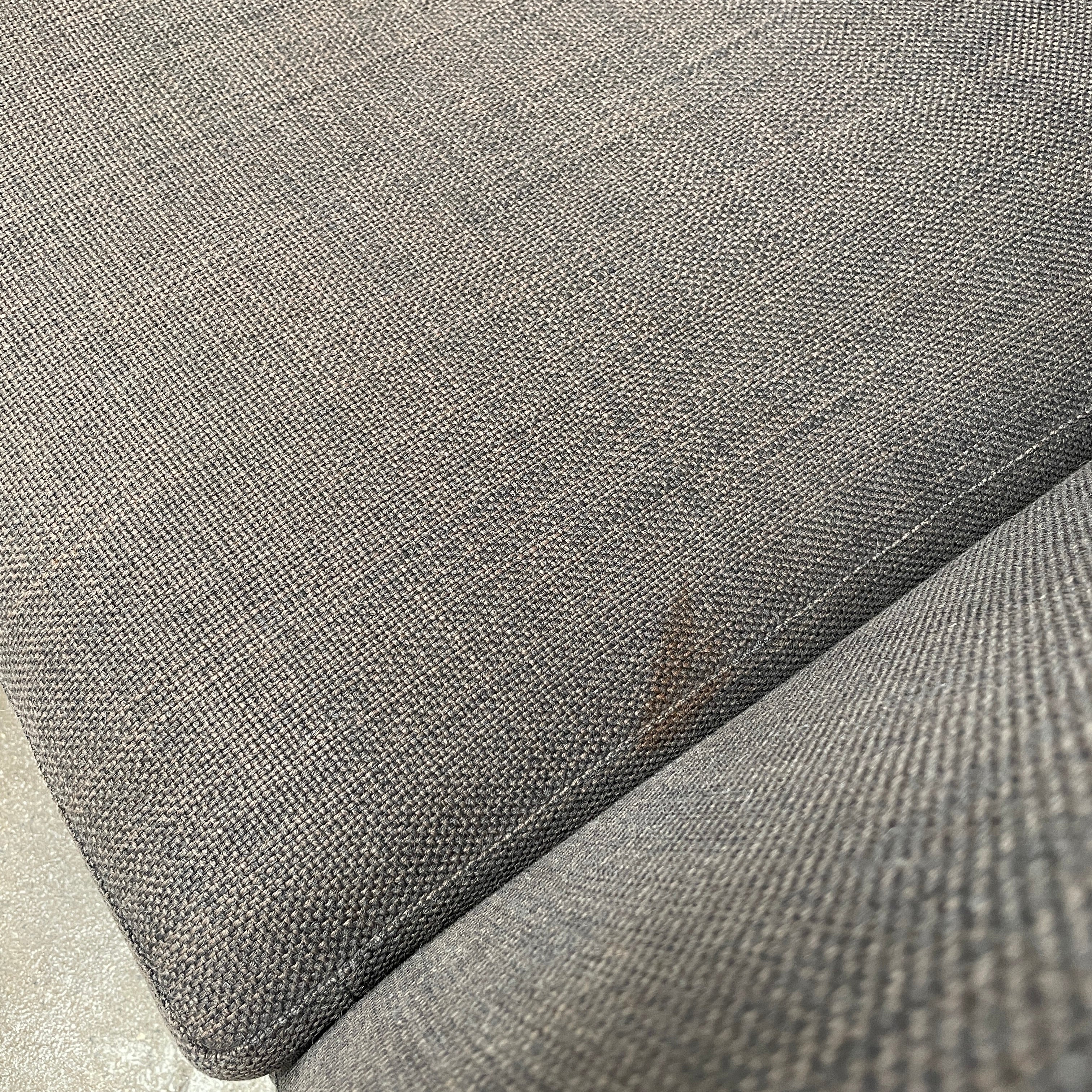 Elegant dark gray B&B Italia Charles Sofa with minimalist squared arms and two matching back cushions, showcased against a plain background.