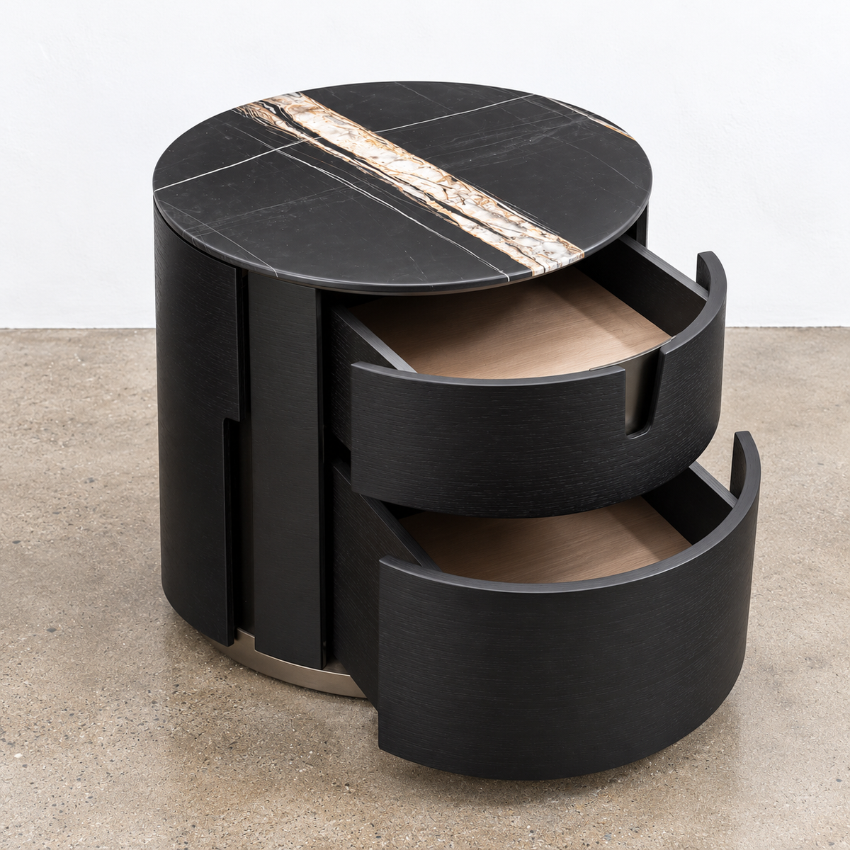 Two cylindrical Porada Tylsa 54 Nightstand Set of 2 units with dark marble tops featuring a single light-colored vein.