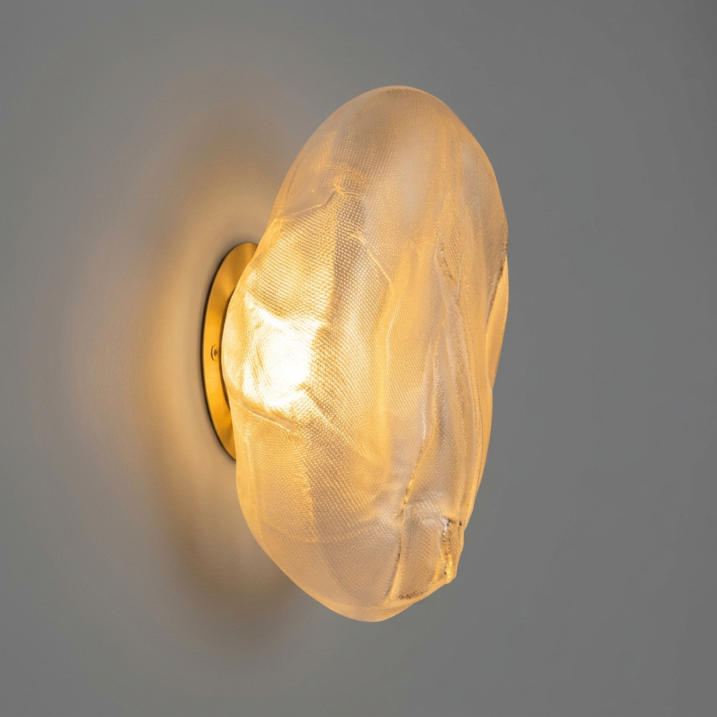 A Bocci 73sp Clear Glass Surface Light with an organic, irregularly shaped form and a textured mesh interior that creates a handcrafted surface light effect.