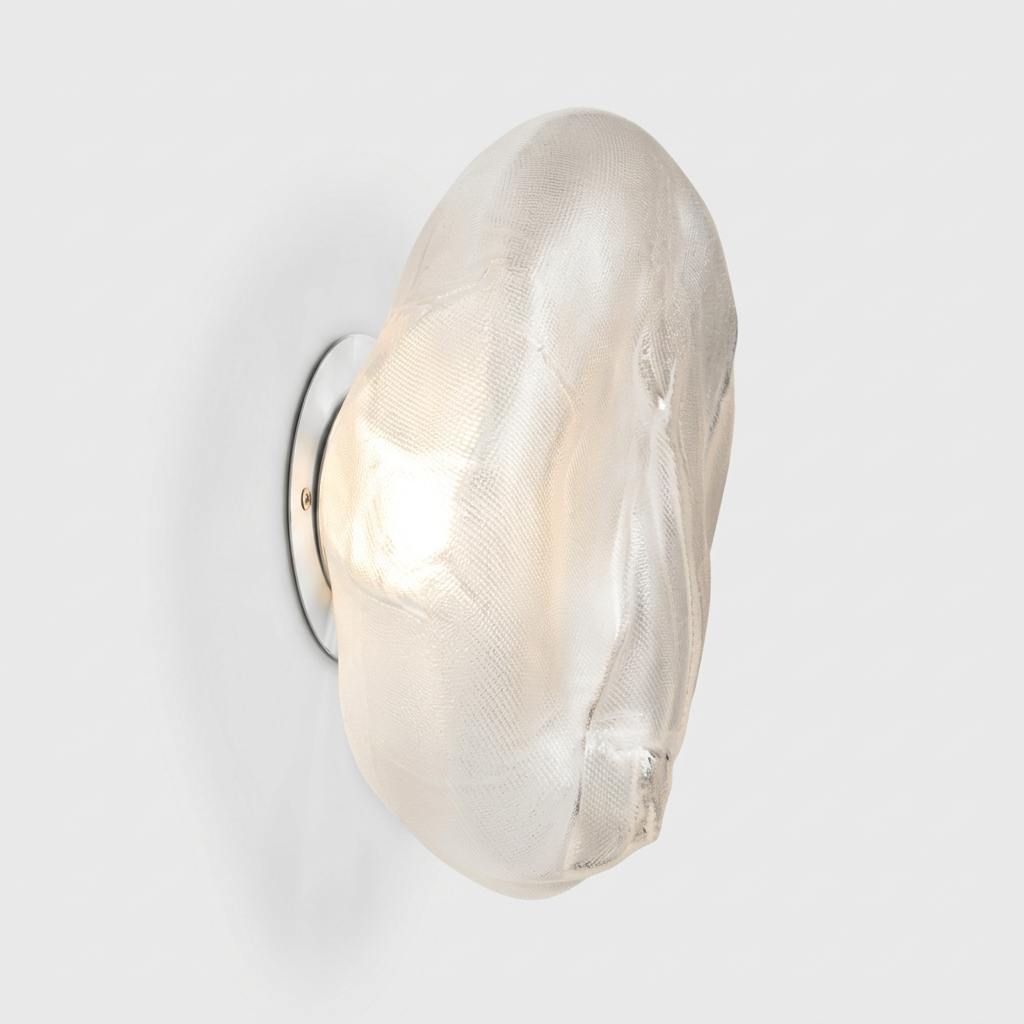 A Bocci 73sp Clear Glass Surface Light with an organic, irregularly shaped form and a textured mesh interior that creates a handcrafted surface light effect.