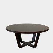 A Maxalto Xilos Dining Table with a black base.
