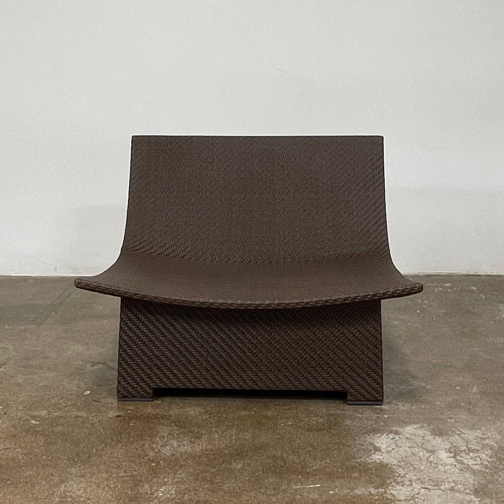 The Dedon Spa Outdoor Lounge Chairs set features two cream-cushioned seats made with proprietary fiber, beautifully displayed side by side against a simple white backdrop.