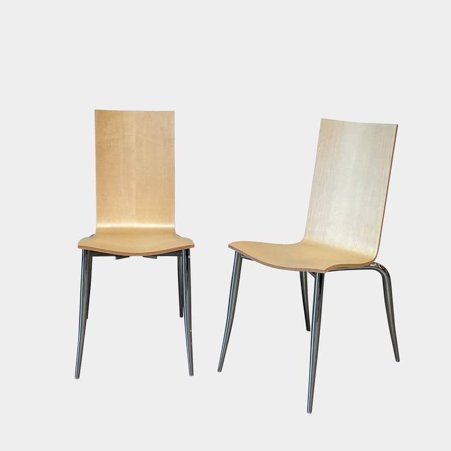 Two Driade Olly Tango Dining Chairs against a white background.