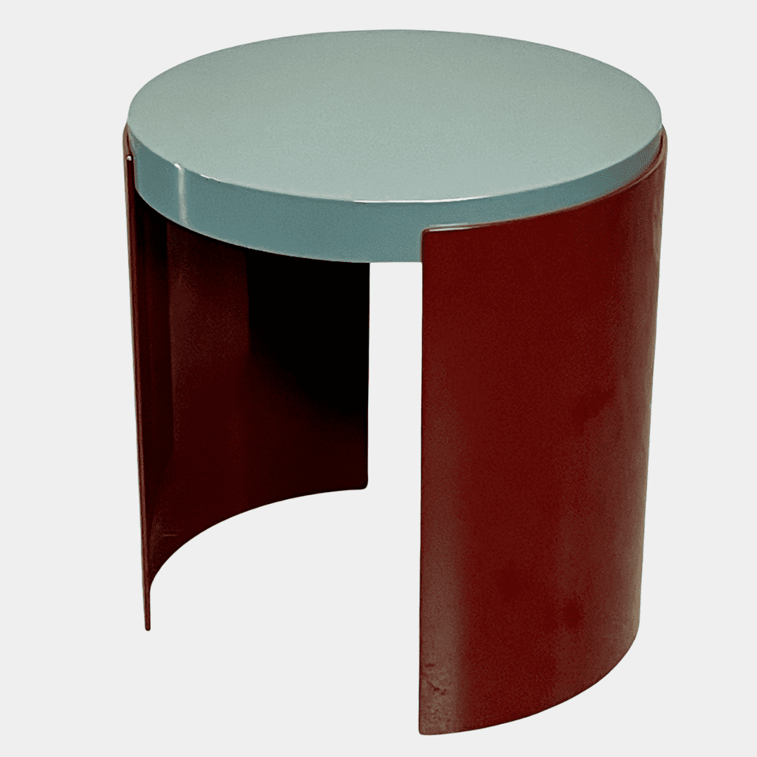 The Cassina Bowy Side Table by Cassina draws from Patricia Urquiola's organic design flair, showcasing a contemporary round structure with a light gray surface and an eye-catching red, curved base.