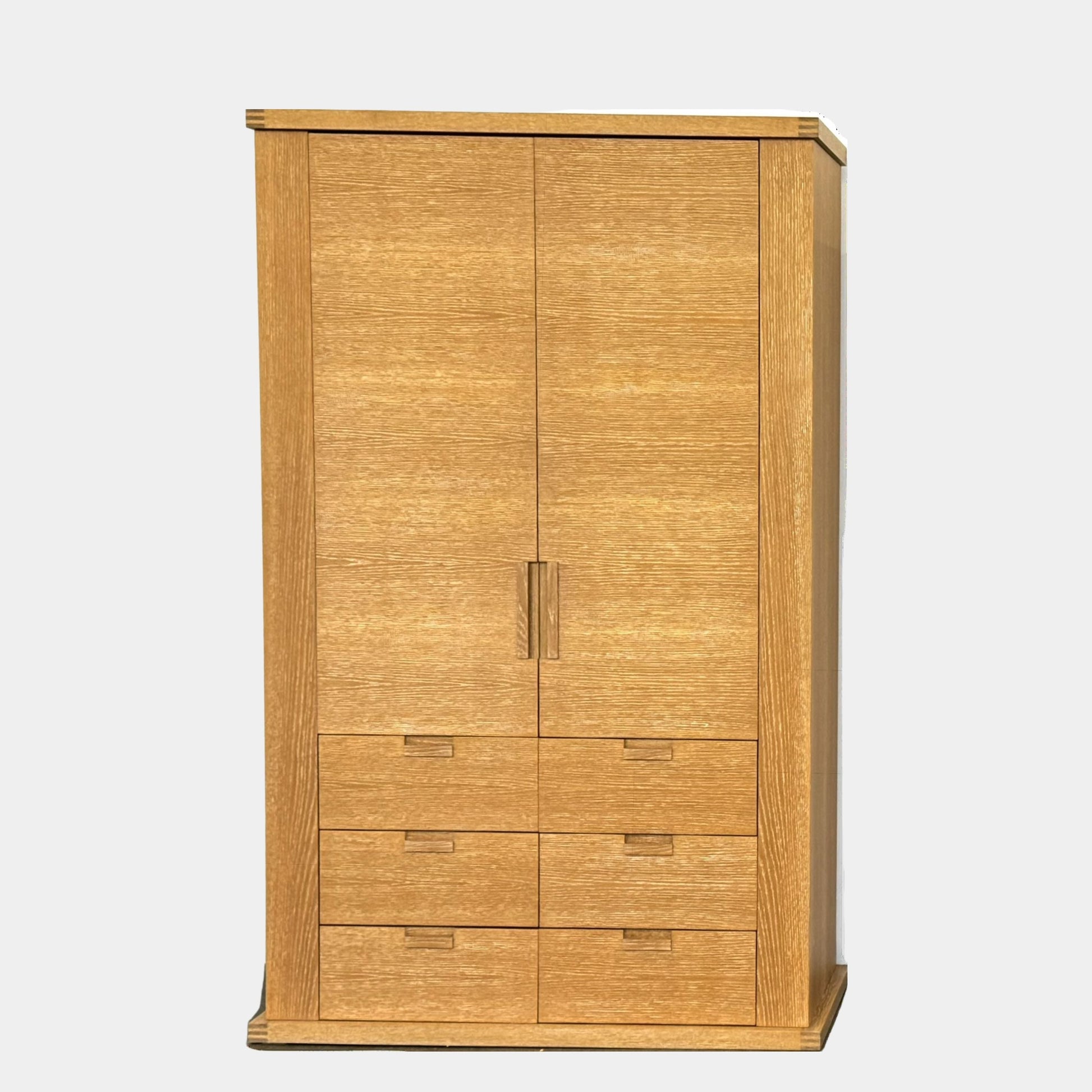 The Maxalto Apta Storage Unit by Maxalto features two vertical doors above and four bottom drawers in two rows, providing versatile storage with convenient shelves and drawers.