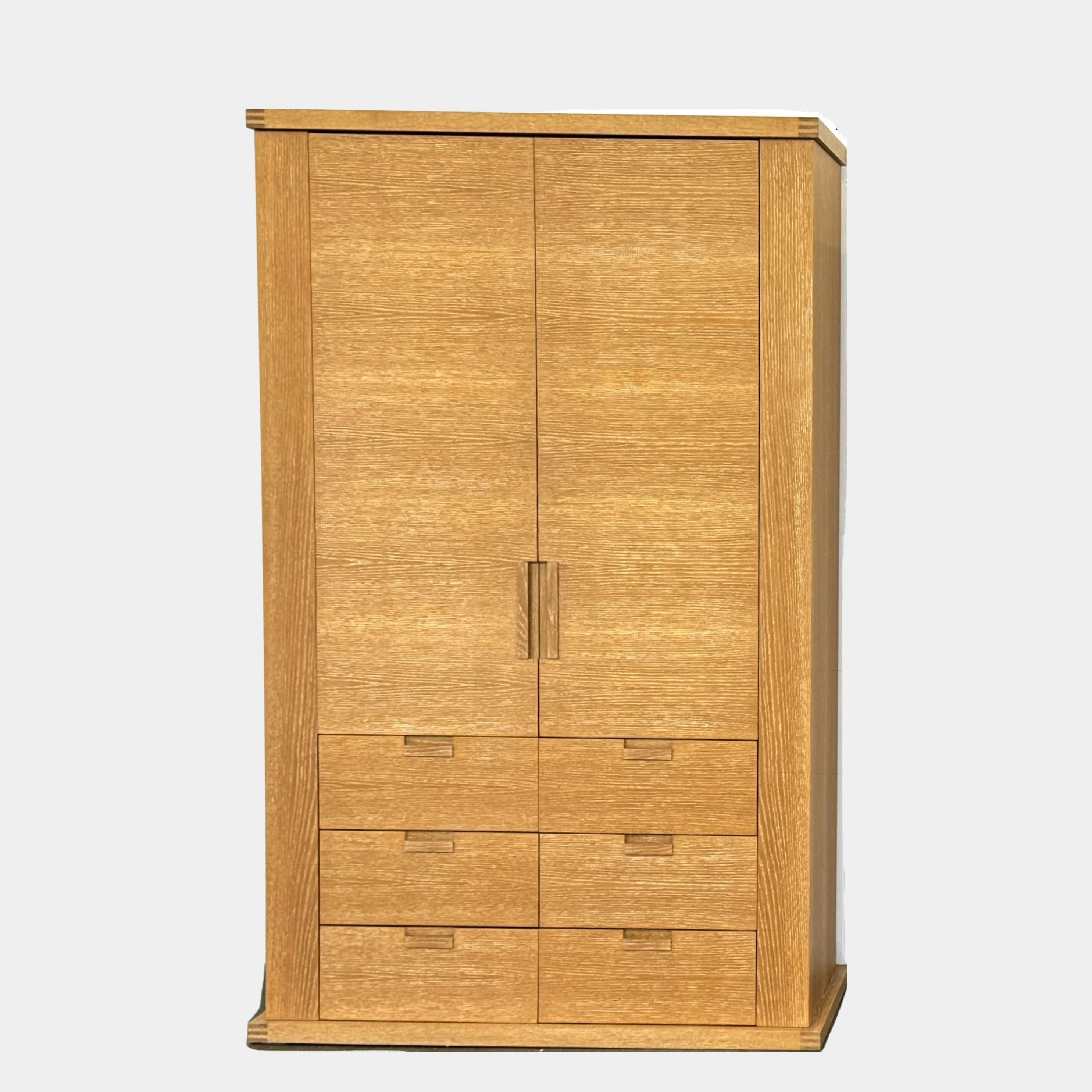 The Maxalto Apta Storage Unit by Maxalto features two vertical doors above and four bottom drawers in two rows, providing versatile storage with convenient shelves and drawers.