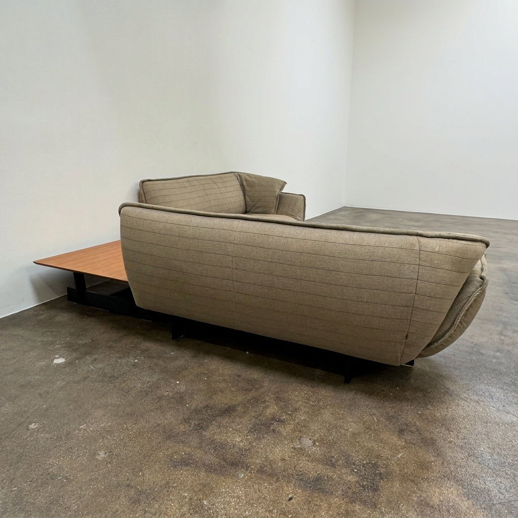 Two tan upholstered Cassina Beam Sectional Sofa with Corner Table sections connected by a rectangular wooden corner table.