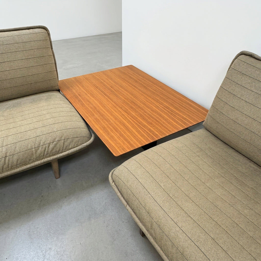 Two tan upholstered Cassina Beam Sectional Sofa with Corner Table sections connected by a rectangular wooden corner table.