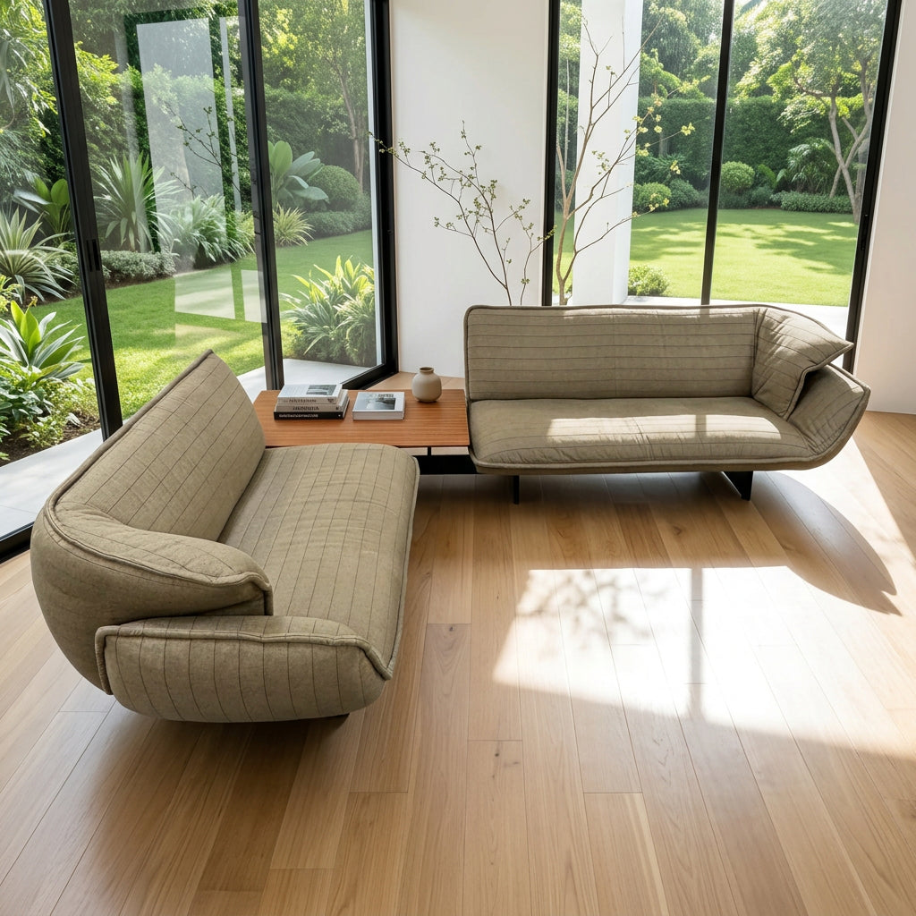 Two tan upholstered Cassina Beam Sectional Sofa with Corner Table sections connected by a rectangular wooden corner table.