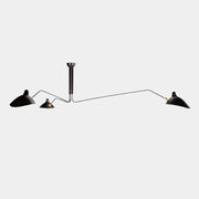 The Serge Mouille 3 Arm Ceiling Light by Serge Mouille features three black conical shades on adjustable metal arms from a central ceiling mount, displayed against a plain white background.