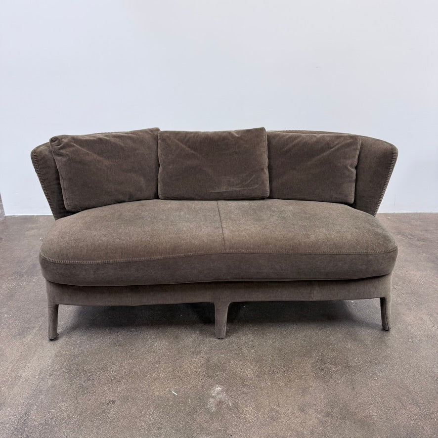 Small gray Maxalto Febo Small Sofa with a curved back, three back cushions, and visible stitched seams.