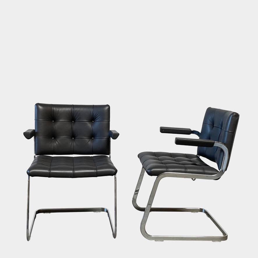 A pair of De Sede RH-305 Dining Chairs, perfect for seating comfort in any living space.