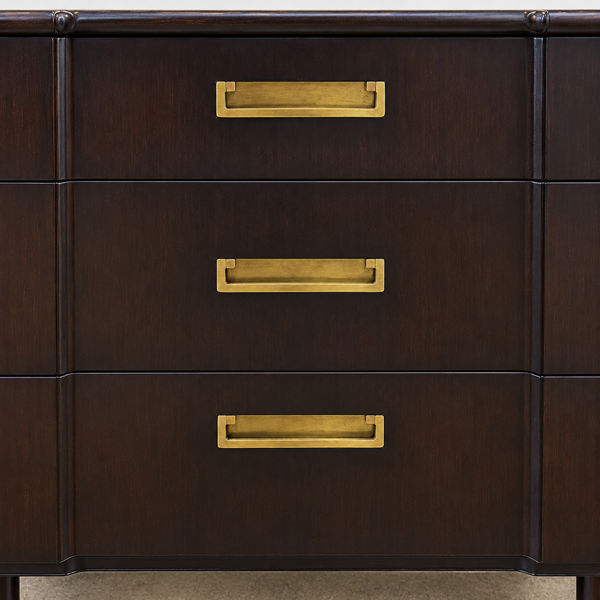 Vintage John Widdicomb Three Drawer Chest in dark wood, featuring three drawers with rectangular brass pulls and tapered legs.