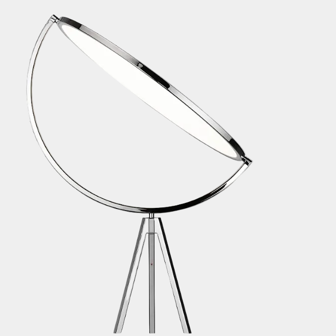 The Flos Superloon Floor Lamp by Flos features a round light on a three-legged chrome stand with a modern tripod design, set against a plain light background.
