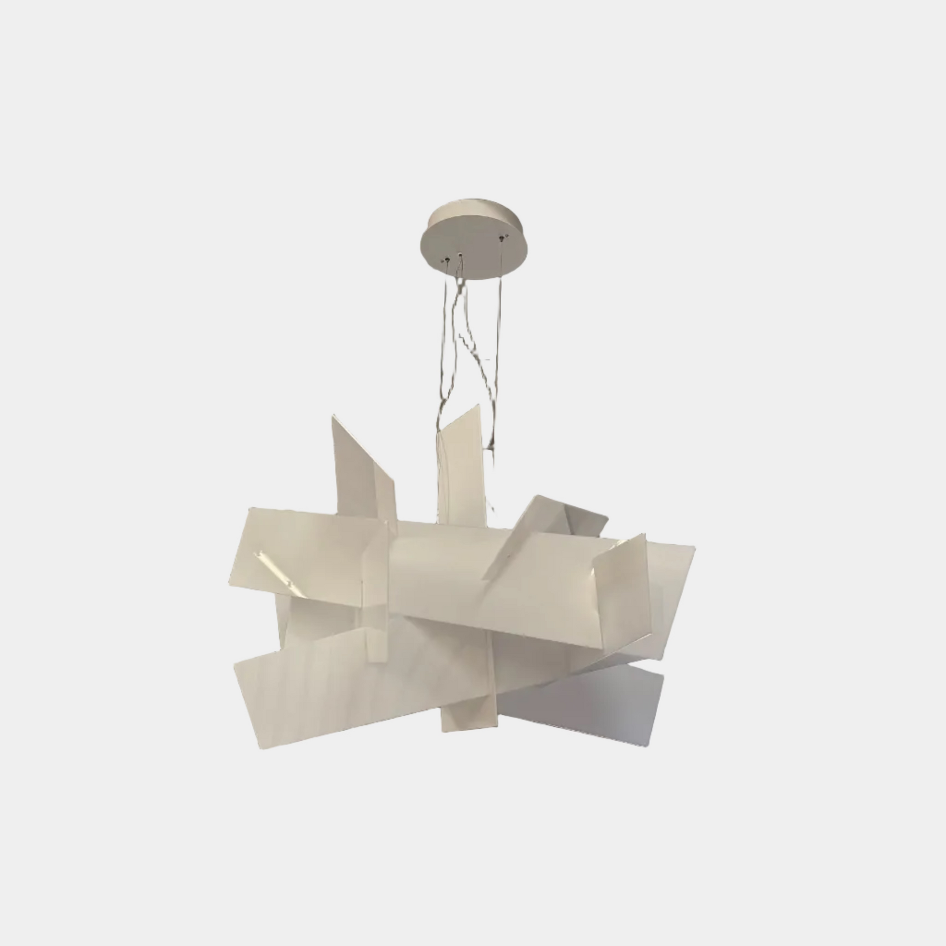The Foscarini Big Bang LED Pendant, by Foscarini, features sculptural overlapping rectangular panels that emit a warm glow—ideal statement lighting for contemporary spaces.