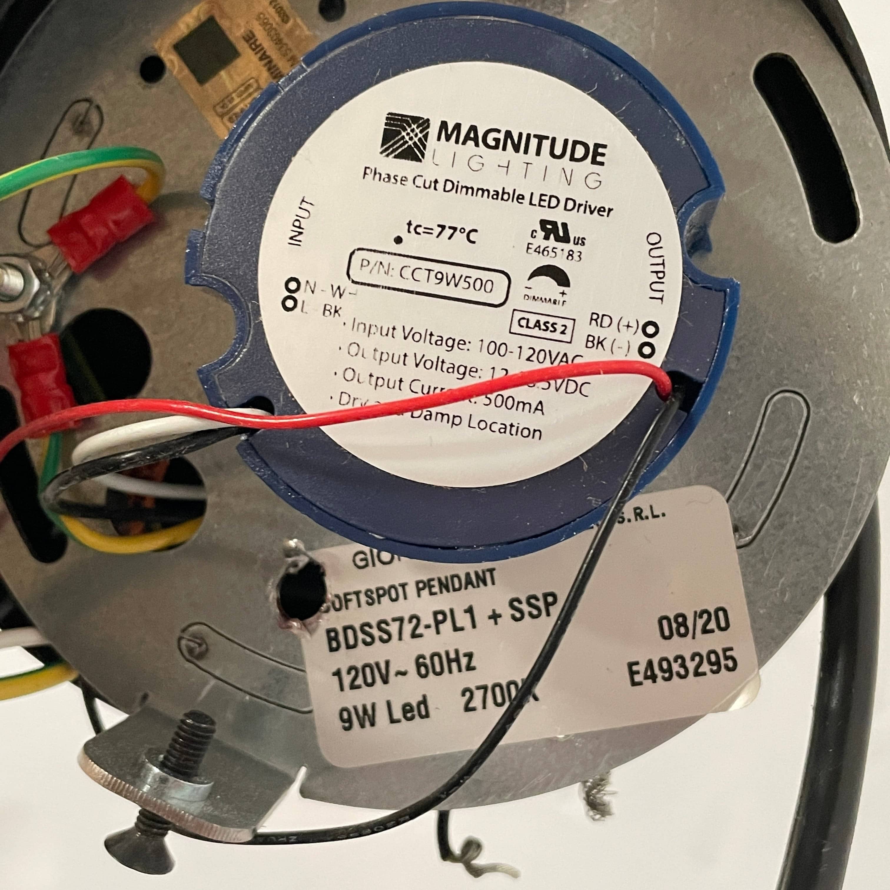 A Giopato & Coombes Softspot Pendant light hanging from a ceiling.