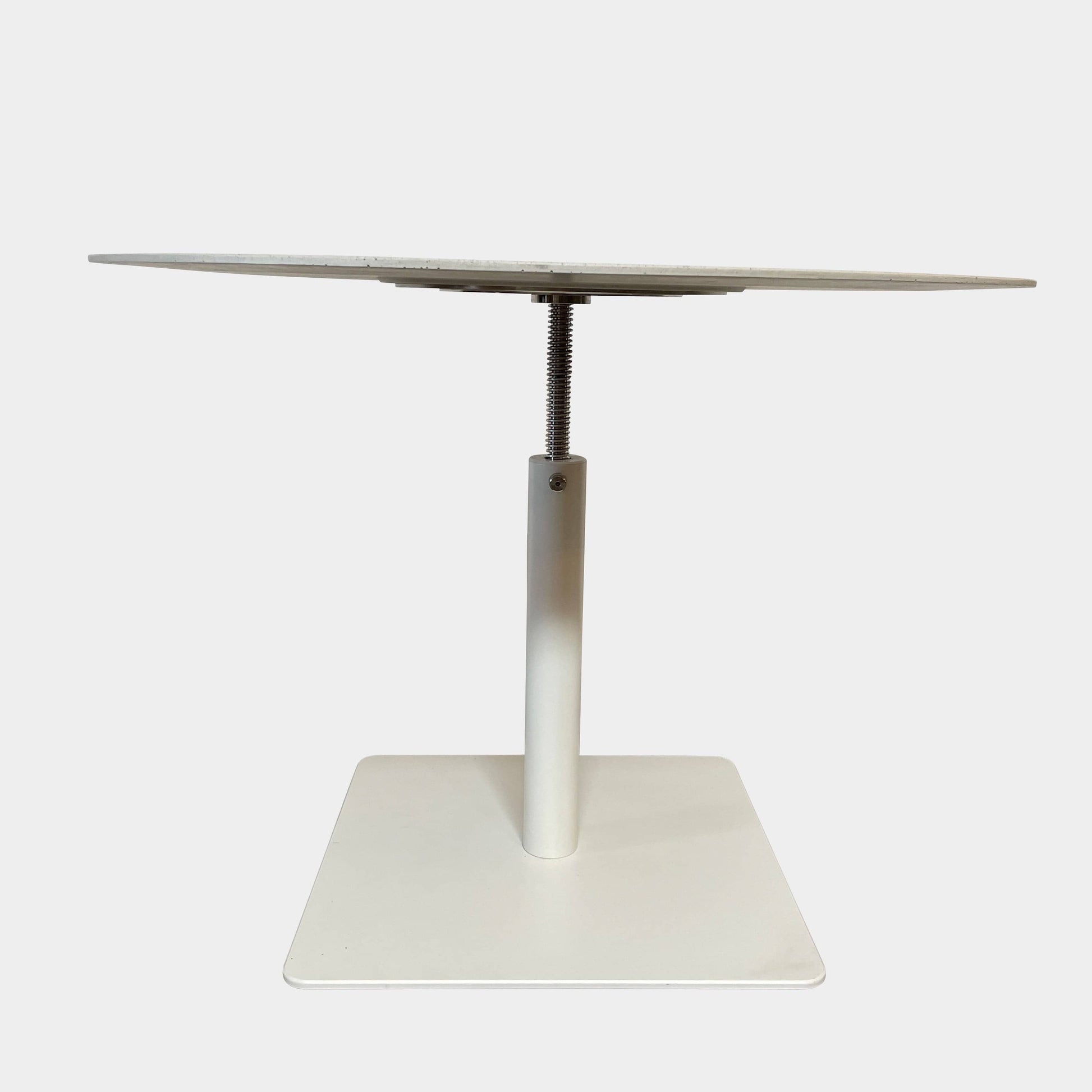 An adjustable-height Paola Lenti Giro Outdoor Side Table for outdoor living, displayed on a white background.