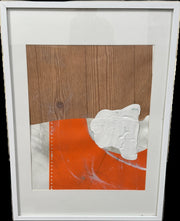 The "Allison Caesar Mixed Media Collage Orange and Wood Panel" by Modern Resale features abstract artwork with a wood grain pattern at the top, an orange section accented with white paint in the lower half, and a textured white shape overlapping both areas, all elegantly framed in white.