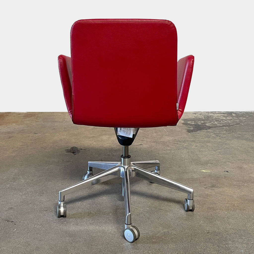 A Zanotta 2280 Lady Task Chair, adorned in red leather, placed on a crisp white background.