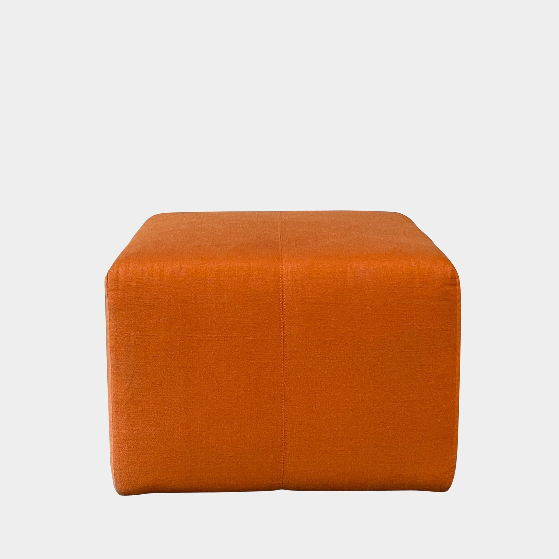 A small B&B Italia P60 ottoman on a white background.